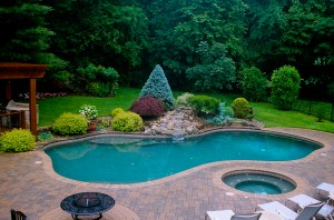 Poolside Waterfall with Formal Planting